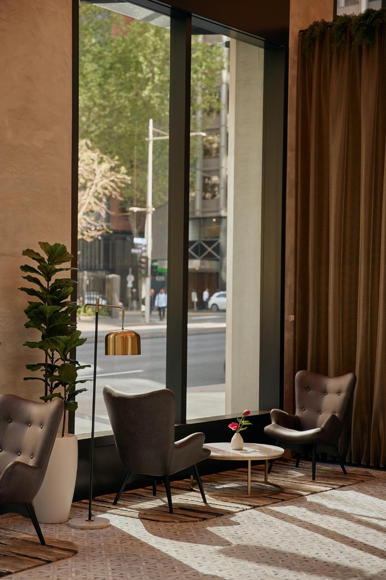 Meriton Suites Melbourne City Exterior foto The interior of the hotel