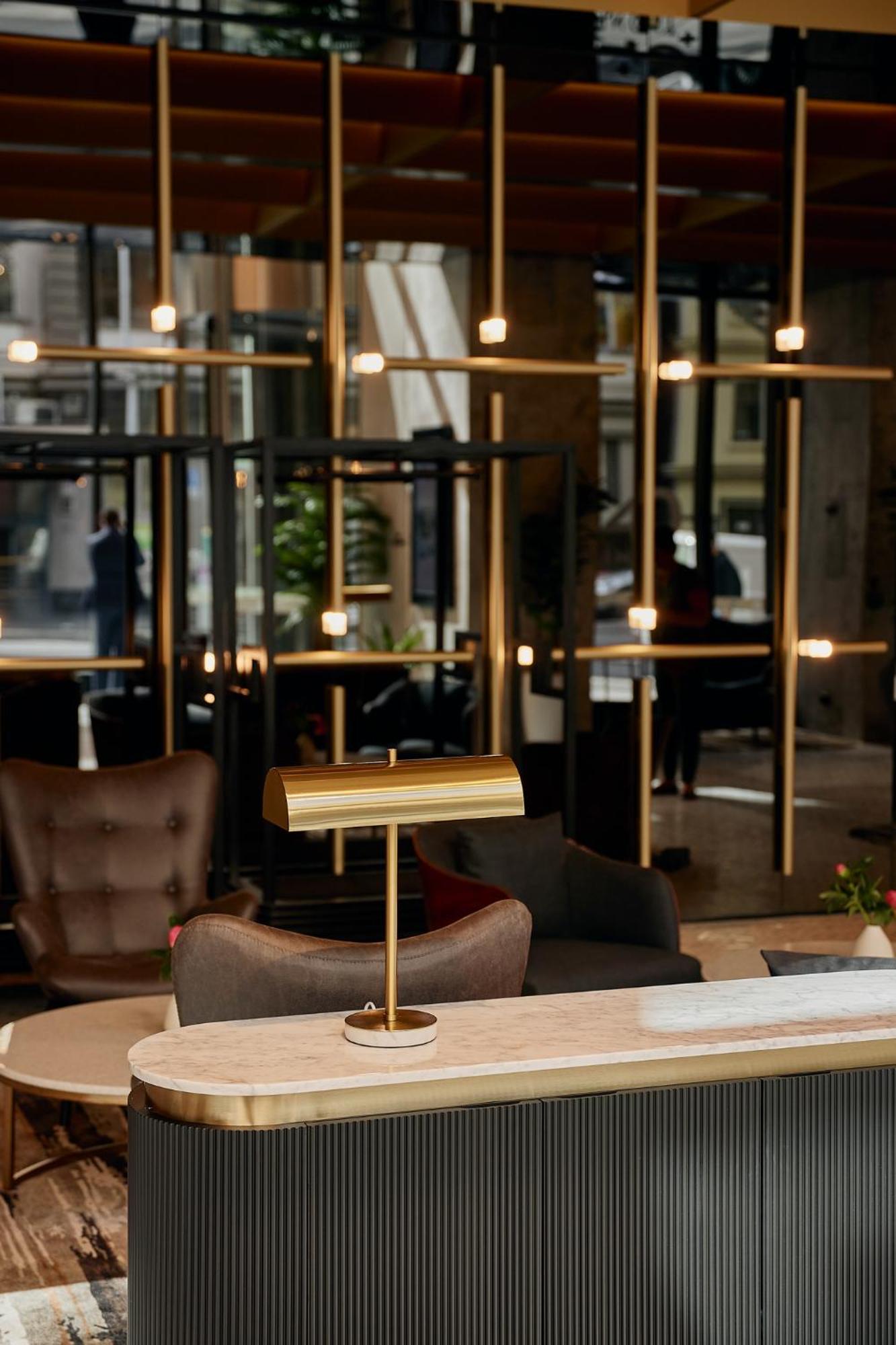 Meriton Suites Melbourne City Exterior foto The interior of the lounge