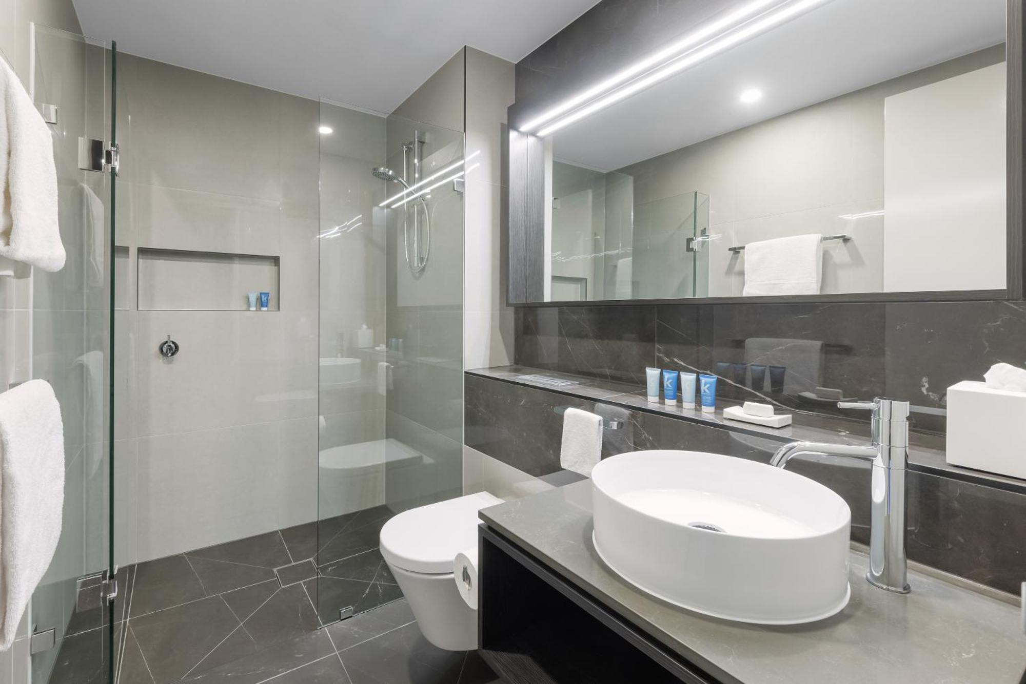 Meriton Suites Melbourne City Exterior foto A modern bathroom