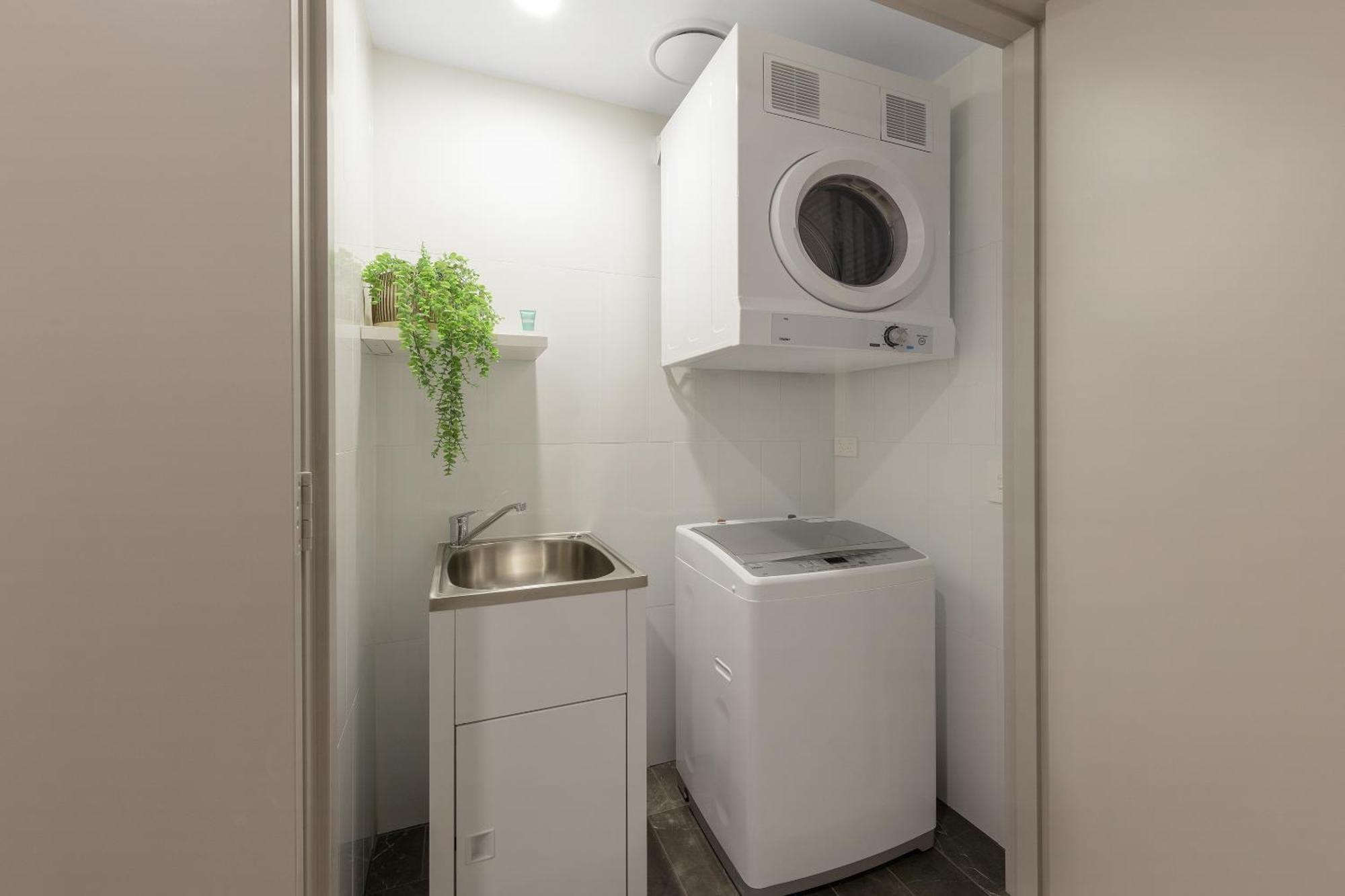 Meriton Suites Melbourne City Exterior foto Laundry room